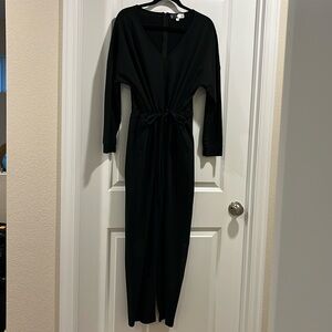 Classic Long Sleeved Black Jumpsuit with Defined Waist and Relaxed Fit